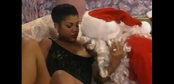  Black slut Desire Dupree rides ebony Santa&039;s dick on the bed